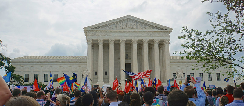 Crowd in front of United States Supreme Court in Washington, DC celebrating decision legalizing gay marriage in the United States